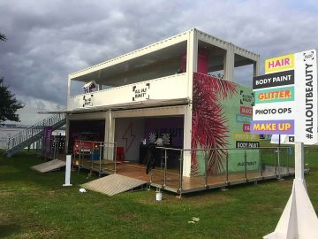 All Out Beauty bespoke shipping container conversion festival makeup and hair activation using multiple containers for UK festivals.